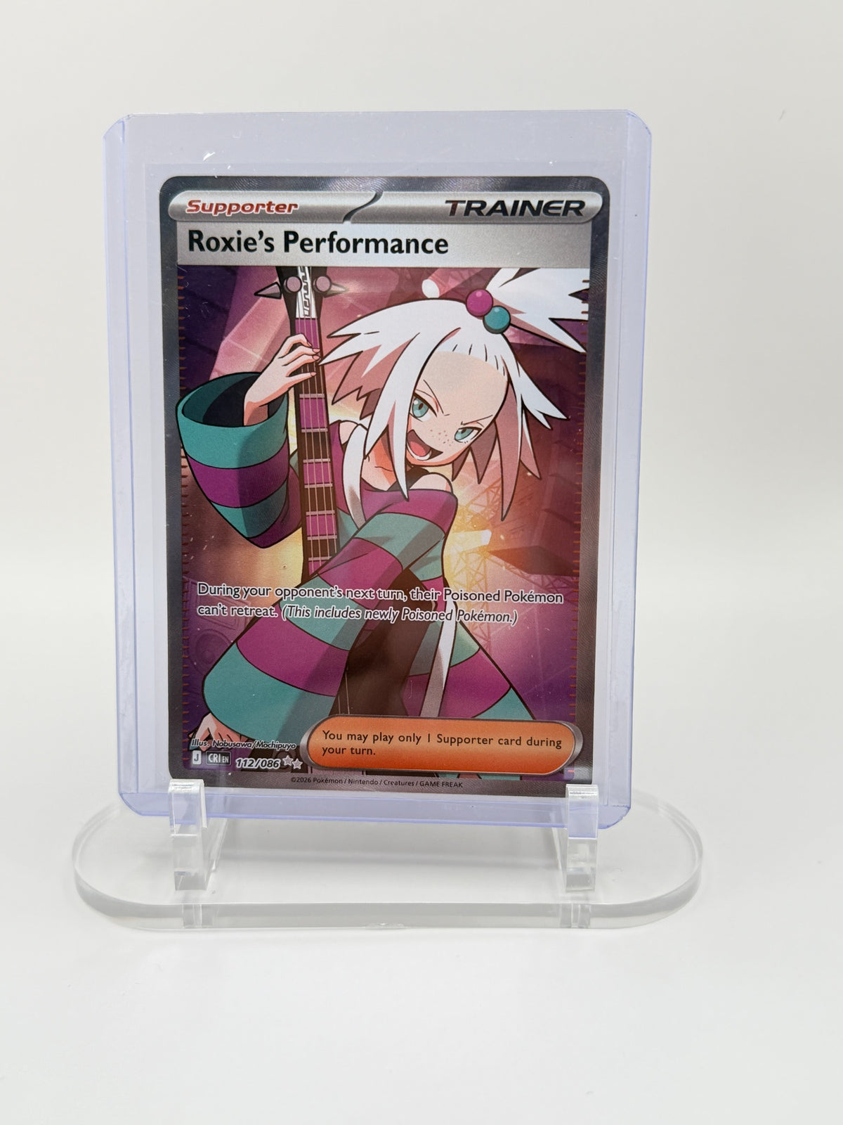 Roxie's Performance 112/086 Ultra Rare Chaos Rising Pokémon card front